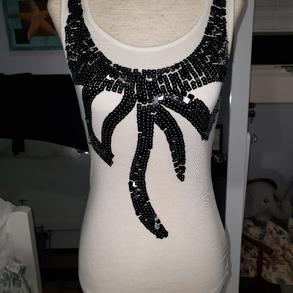 Unique bowtie sequin tank too